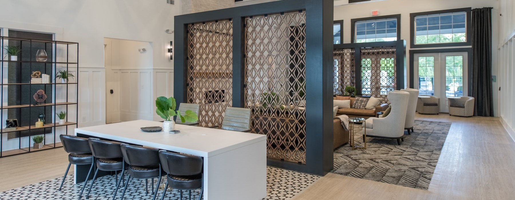 a leasing office with a desk and chairs