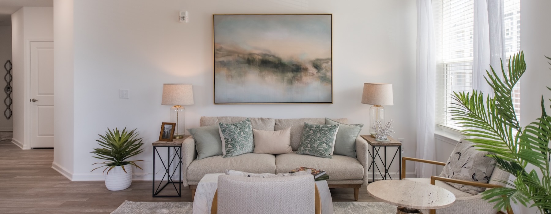 living room with a couch and tables