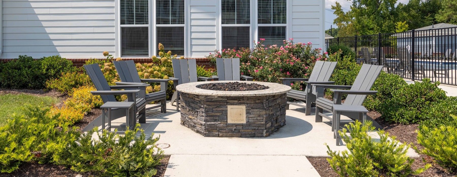 a firepit with chairs